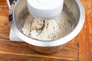 kitchen processor kneads dough photo