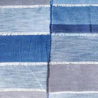 patchwork from various denim flaps photo