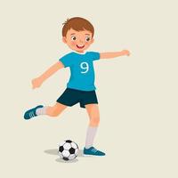 cute little boy playing soccer kicking the football to make a goal vector