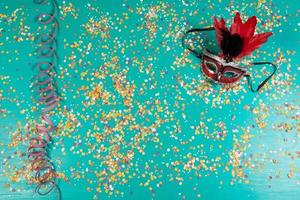 Background of confetti with elements related to the carnival and summer photo