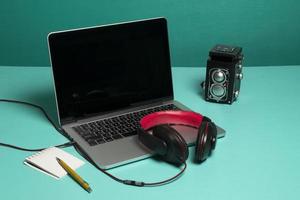 Red earphone on a notebook photo