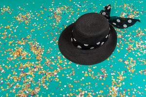 Background of confetti with elements related to the carnival and summer photo