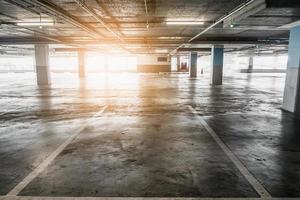 interior of empty vacant car parking garage in department store photo