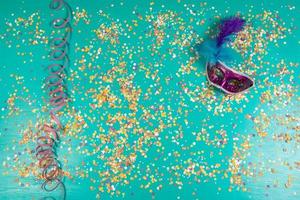 Background of confetti with elements related to the carnival and summer photo