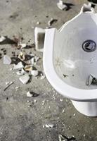 Broken toilet bowl photo