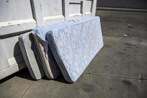 Mattresses in the trash photo
