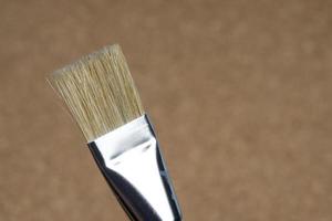 detail of brush bristles on cork background photo