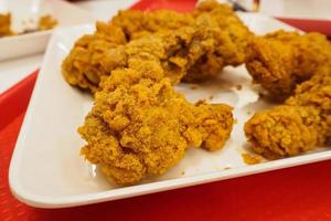 fried chicken on white plate photo