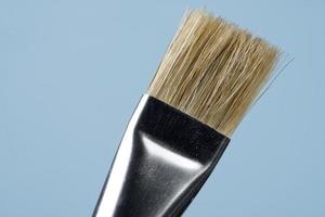 detail of brush bristles with blue background. photo