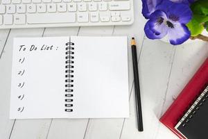 To Do List text on notepad. Directly above. Copy space. photo