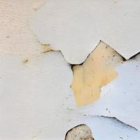 Coarse cracks on the concrete wall photo