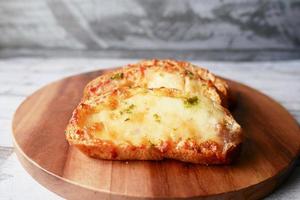 garlic bread on a chopping bread photo