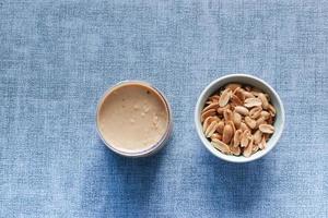 top view of peanut butter in a container , photo