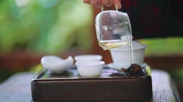 Tea ceremony performed on outdoor terrace video