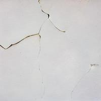 concrete surface wall with cracks texture background photo