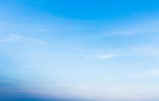 White fluffy cloud in the blue sky photo