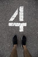 Feet with number four photo