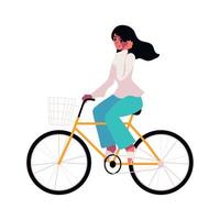 mujer joven montando bicicleta vector