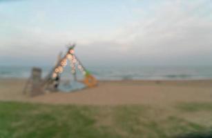 abstract blur camping yard on beach for background photo