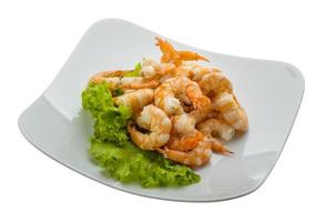 Shrimps cocktail on the plate and white background photo