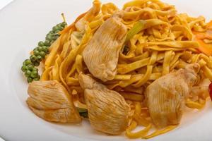 Fried noodles with chicken photo