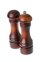Pepper Mill on wooden background photo
