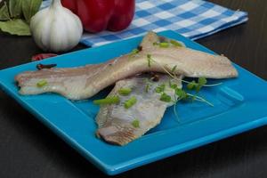 Herring fillet on the plate photo