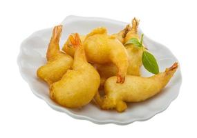 Shrimp tempura on the plate and white background photo