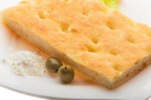 Olive bread on the plate photo