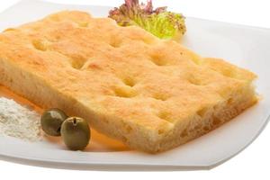 Olive bread on the plate photo