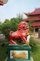 red lion statue in sam poo kong semarang photo