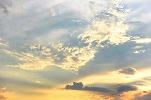 Beautiful sunset sky above clouds with dramatic light - sky with cloud before sunset photo