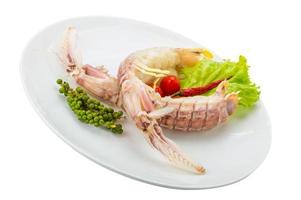Boiled Spiny lobster on the plate and white background photo