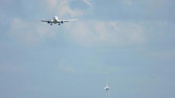 Airplane approaching before landing on runway 18R. Airport of Amsterdam, Netherlands video