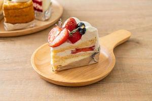 strawberry fresh cream cake on plate photo