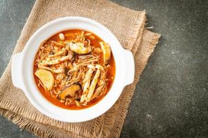 Stir-fried Spicy Mushroom with Tom Yum Soup photo