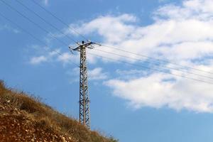 Electrical wires carrying high voltage current. photo