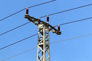 Electrical wires carrying high voltage current. photo