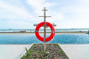 lifebuoy ring near swimming pool photo