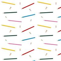 Pattern of colored pencils on a white background. School. School patterns. photo