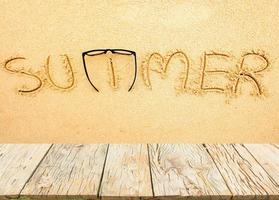 The word summer on the sand photo