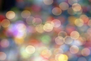 Multicolored defocused bokeh lights background photo