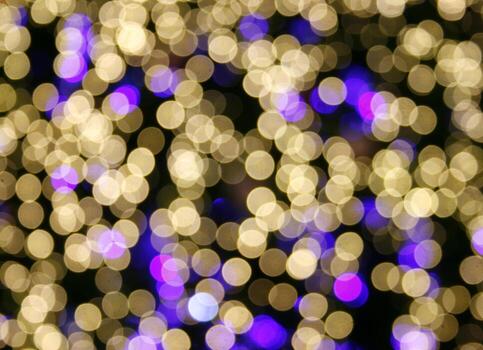 Multicolored defocused bokeh lights background photo