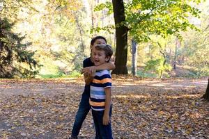 Cheerful boys having fun at the park. photo