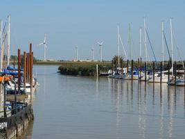 ditzum,germany,2020-the small village of ditzum at the river ems in germany photo