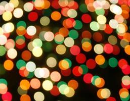 Multicolored defocused bokeh lights background photo