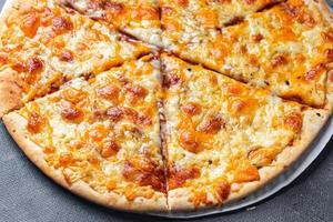 cheesy pizza types of cheese dish healthy meal food snack on the table copy space food background photo