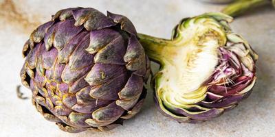 artichoke fresh plant dish healthy meal food snack diet on the table copy space food background rustic top view keto or paleo diet veggie photo