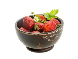 Ripe strawberry in a bowl on white background photo