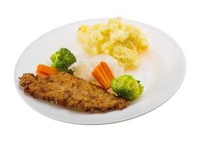 schnitzel on the plate and white background photo